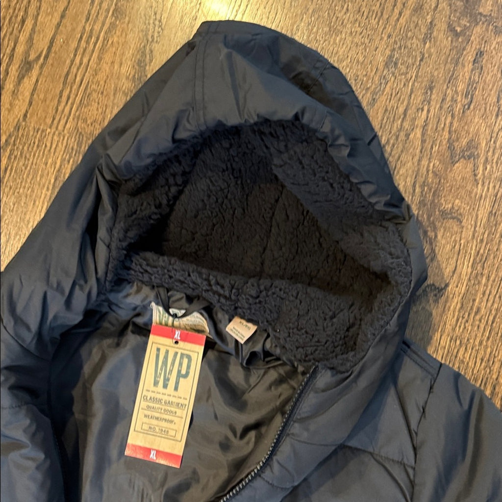 Weather proof woman’s long packable jacket XL NEW