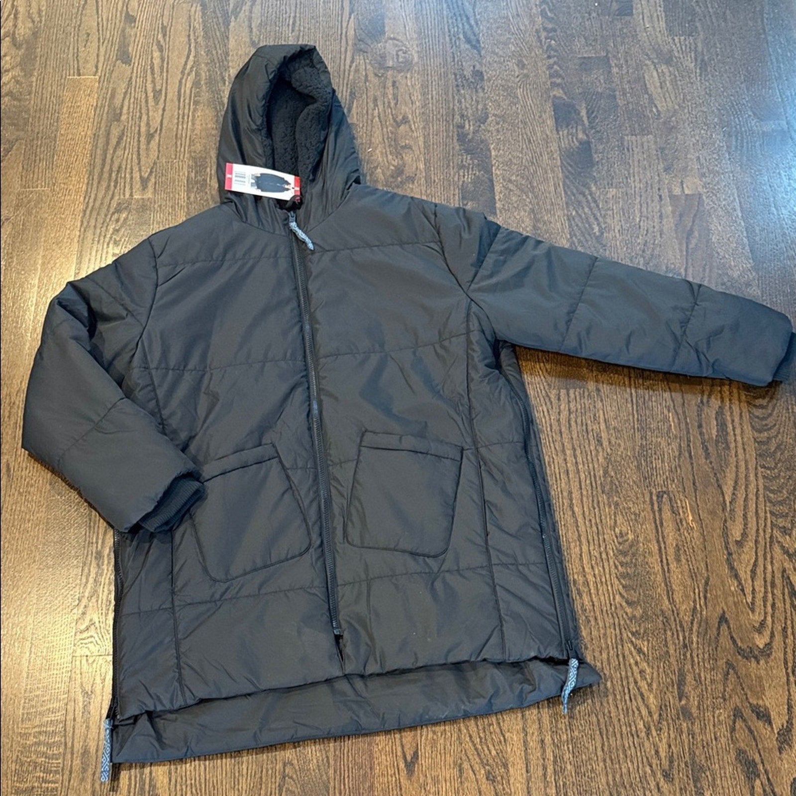 Weather proof woman’s long packable jacket XL NEW